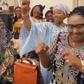 Sierra Leone's First Lady and other women dance to celebrate child marriage ban