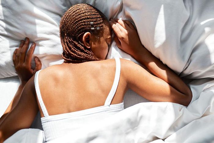 Black person sleeping [Everyday Health]