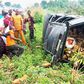 A FRSC officer offers help to an accident victim.