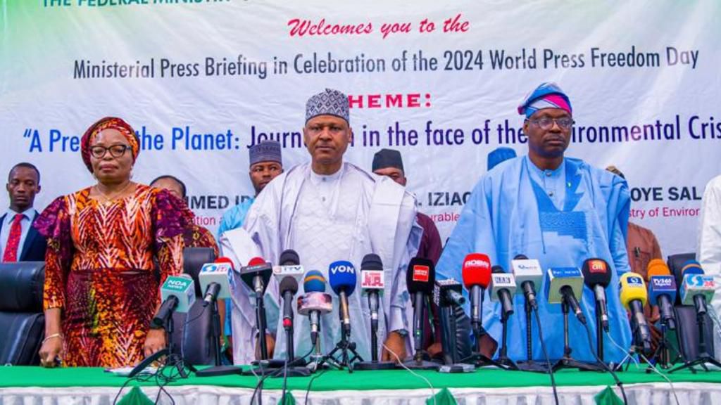 L-R: Permanent Secretary, Federal Ministry of Information and National Orientation, Dr. Ngozi Onwudiwe; Minister of Information and National Orientation, Alhaji Mohammed Idris; Minister of State, Environment and Ecological Management, Dr. Iziaq Adekunl...