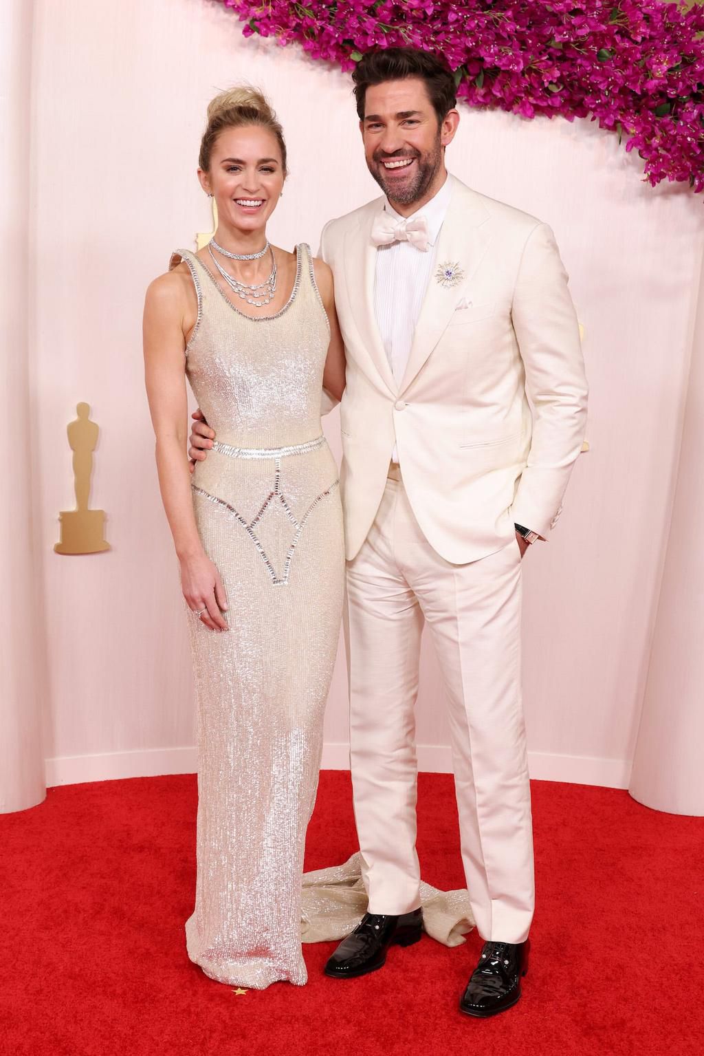John Krasinski and Emily Blunt matched in cream-colored ensembles.