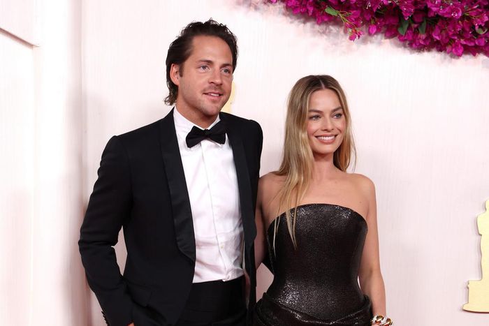 Margot Robbie strayed from "Barbie" fashion, and her husband, Tom Ackerley, followed suit.