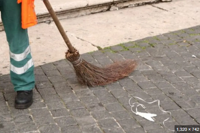 A man sweeping [Vanguard News]