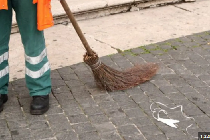 A man sweeping [Vanguard News]