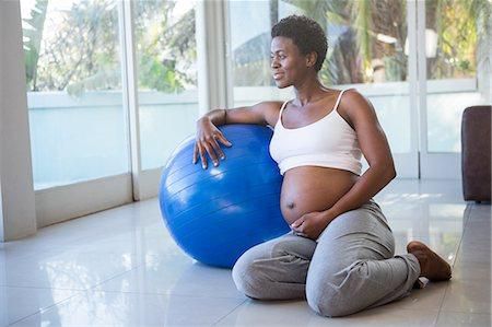 A pregnant woman working out