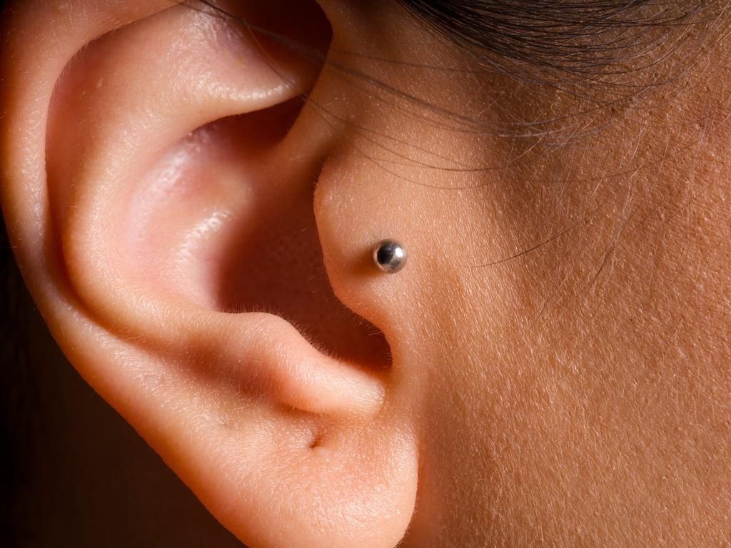 My headphones and hair would irritate my tragus piercing.erdalislakphotography/Shutterstock