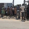 Lagosians queue under the sun waiting for rice from the Nigeria Customs Service