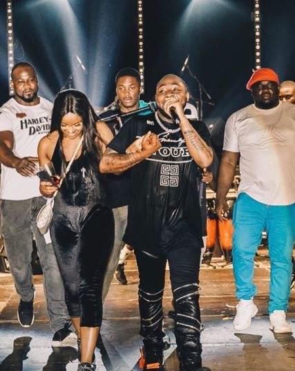 Davido performs on stage with Chioma