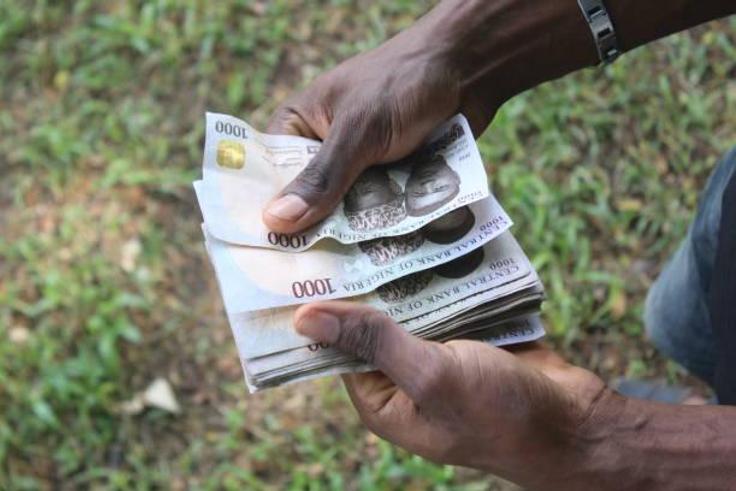 Church gives cash gifts to members from tithe to ease economic hardships [iStock]