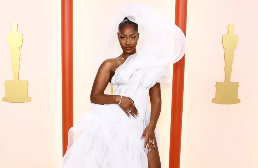 Tems has become known for her show-stopping outfits and statement pieces  [Getty/ARTURO HOLMES]