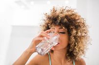 Drinking plenty of water can  help reduce swelling [iStock]
