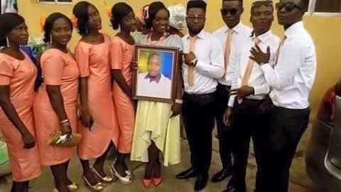 Lady marries photo of groom who couldn’t attend wedding, says he's busy abroad