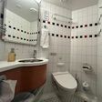 The half bathroom included a toilet and a sink. Lauren Mack