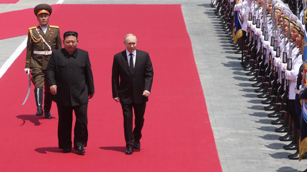 Russian President Vladimir Putin (R) and North Korean Supreme Leader Kim Jong Un attend a welcoming ceremony on June 19, 2024 in Pyongyang, North Korea. [Getty Images]
