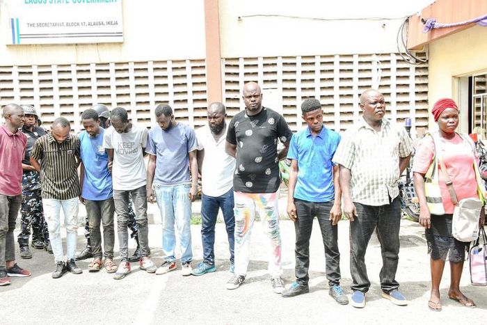 Lagos State Government officials during the arrest of fake enforcement officials in the Cele/Itire area of the state. [Twitter:@Mr_JAGs]