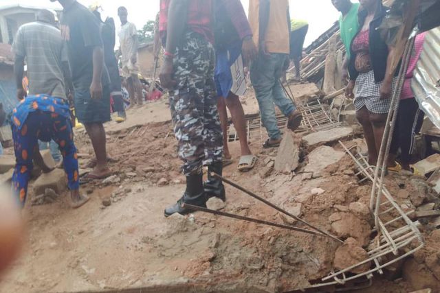 Many are trapped as a two-storey building collapses in Anambra market. [Punch]