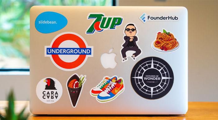 Laptop stickers are a ritual for tech bros [Branding]