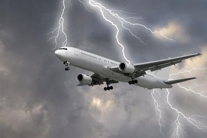Airplane flying during a storm [Shutterstock]