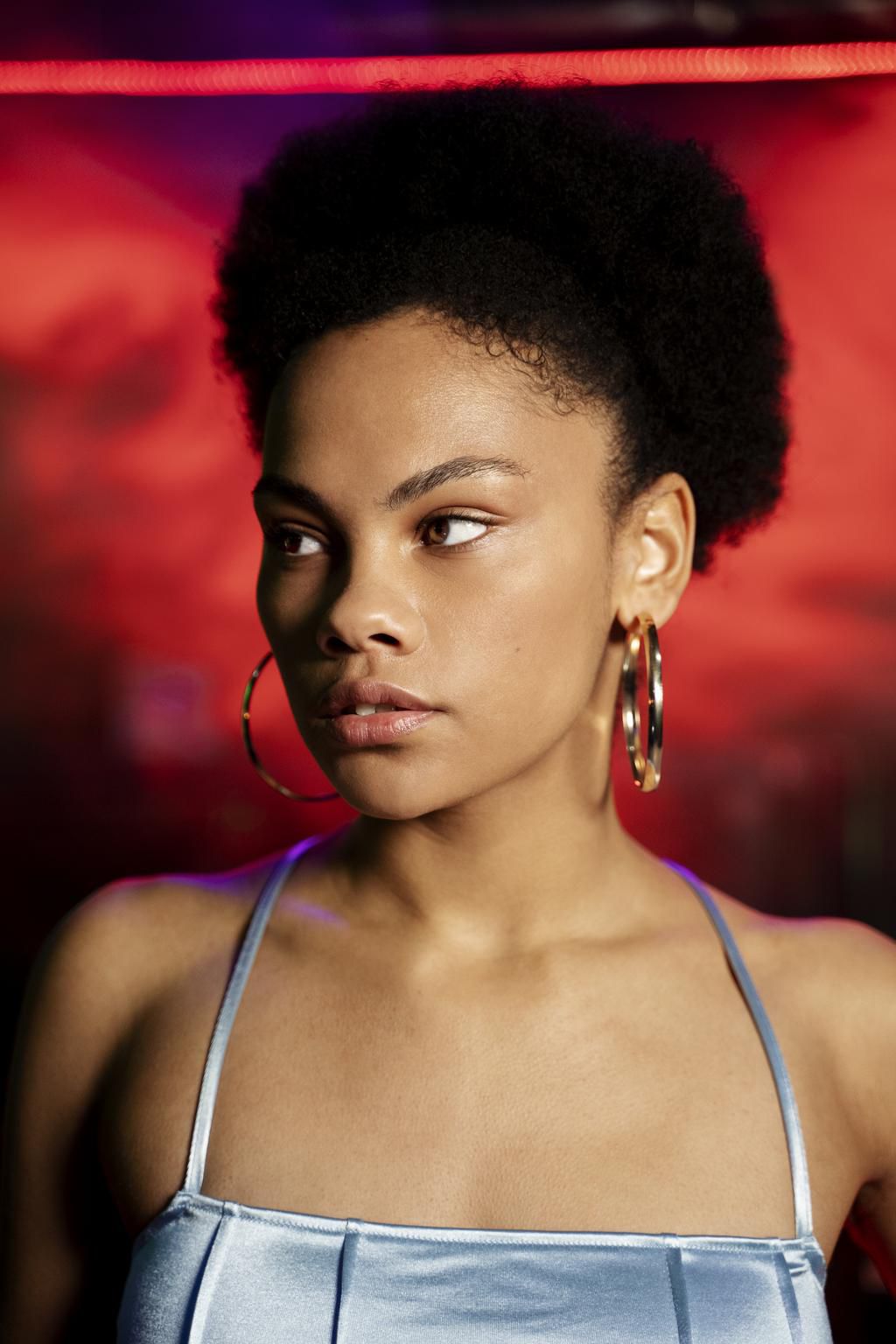 A woman with elegant earrings