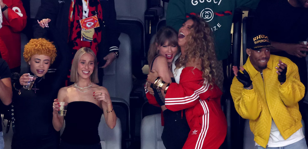 Taylor Swift and lake Lively celebrate after a touchdown[Getty/RobCarr]