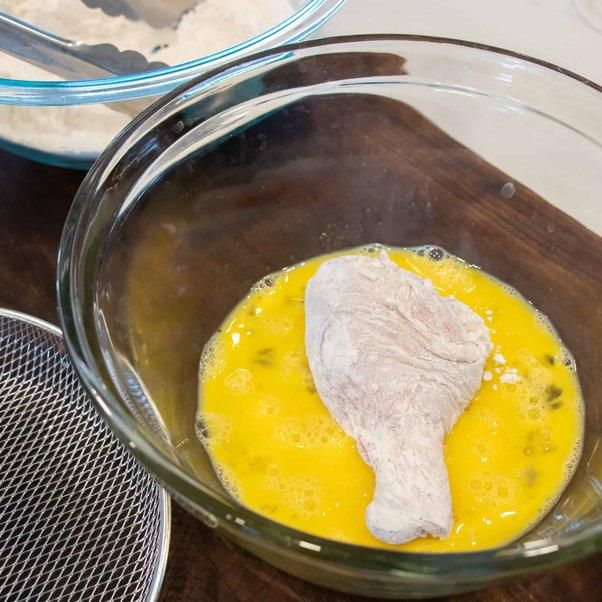 Dip the chicken into the egg mixture [Quora]