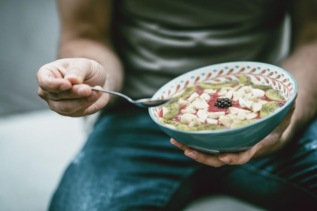 Man Eating Vegan Meal