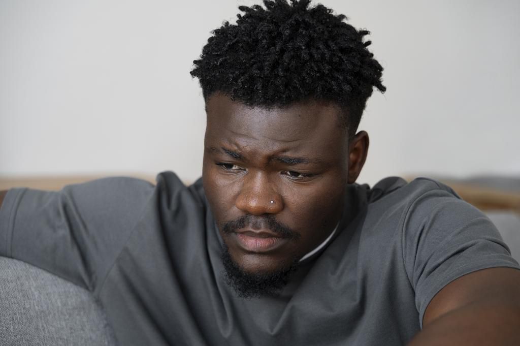 Young-depressed-adult-home