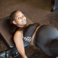 An expectant woman working out