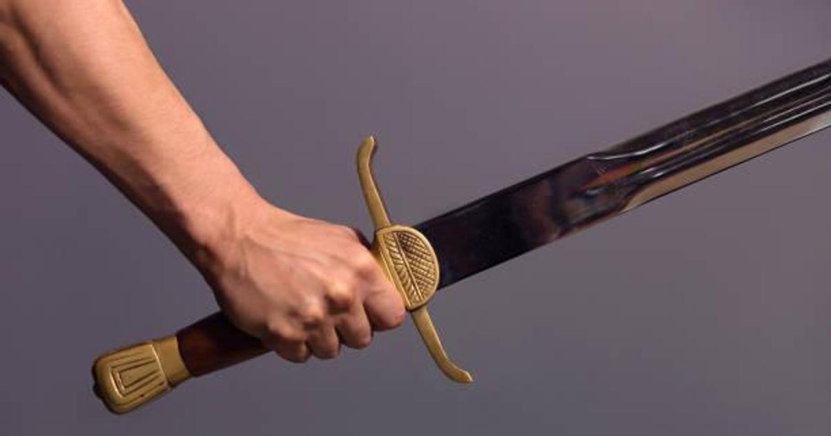 Man with sword arrested after stabbing neighbours, attacks police ...