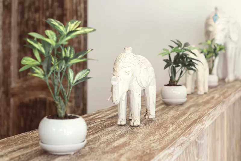Place an elephant statue by the entrance of your house [lovetoknow]