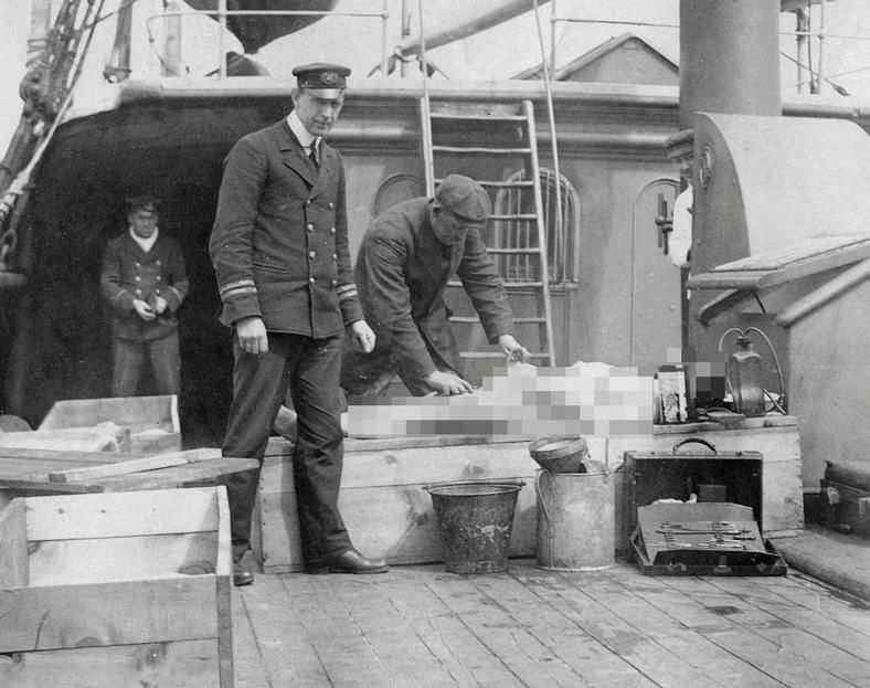 Embalming the body of one of the victims of the Titanic disaster on board the Mackay-Bennett ship [Nova Scotia Museum]