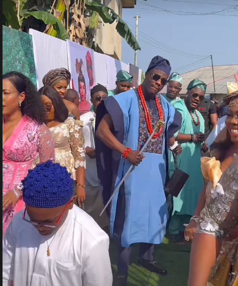 Queen Mercy's husband dancing into the venue [Instagram/Queen Mercy Atang]