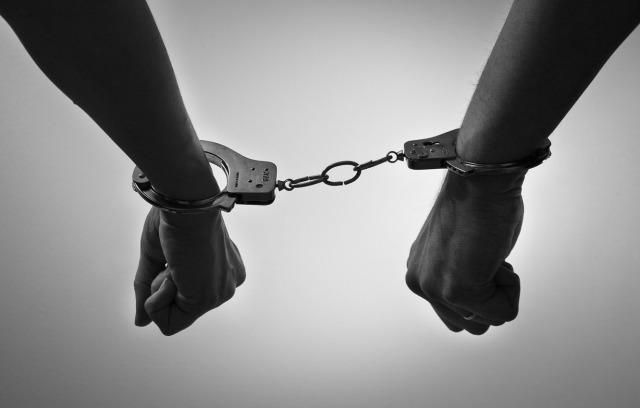 Men handcuffed together [Tumblr]