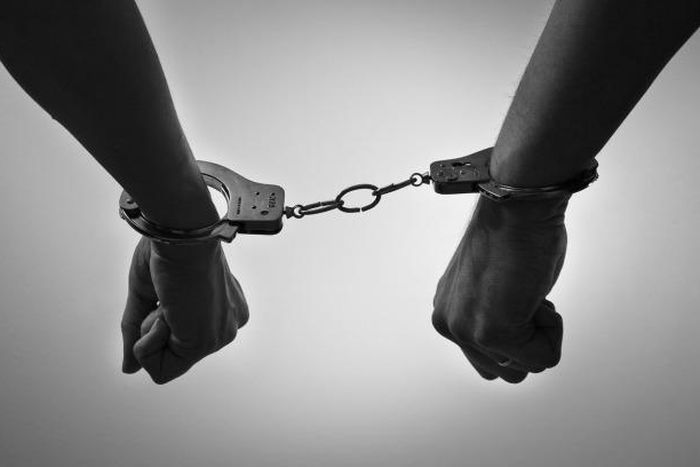 Men handcuffed together [Tumblr]