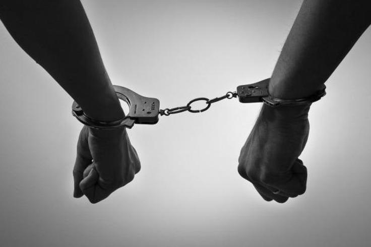 Men handcuffed together [Tumblr]