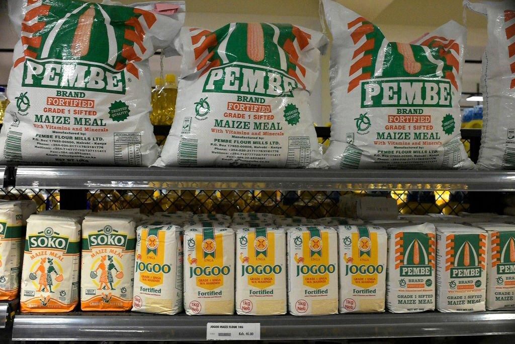 Maize flour bags are displayed on shelves at the Quick Mart Lavington supermarket in Nairobi on January 24, 2019. (Photo by SIMON MAINA/AFP via Getty Images)