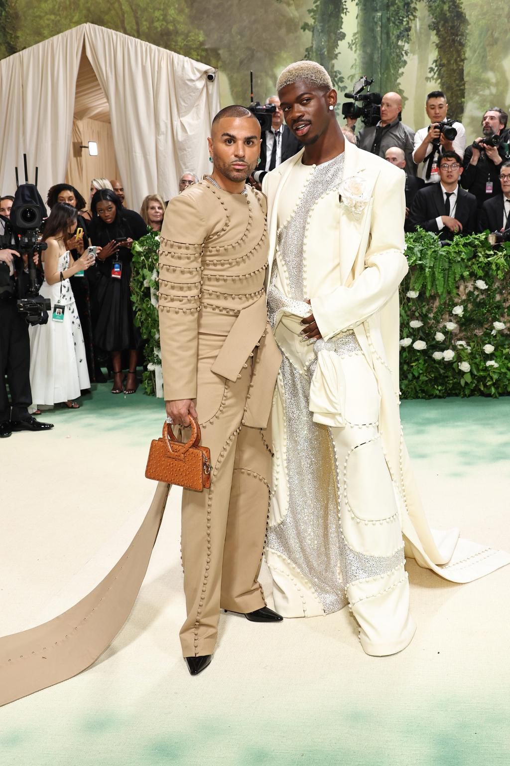 Lil Nas X showed up in style alongside fashion designer Raul Lopez.