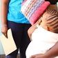 Beth Waithera embraces her baby [Citizen Digital]