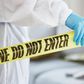 A stock image shows an investigator at a crime sceneJacob Wackerhausen/Getty Images