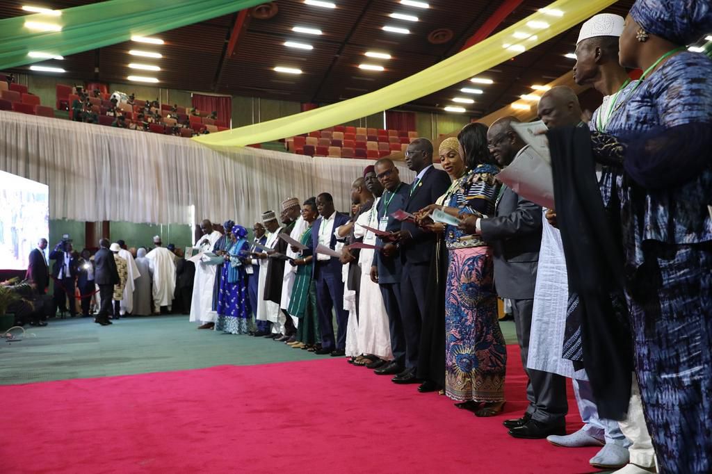 The newly inaugurated legislators of the ECOWAS parliament swearing oath of office before President Bola Ahmed Tinubu. [@ecowas_cedeao/X]