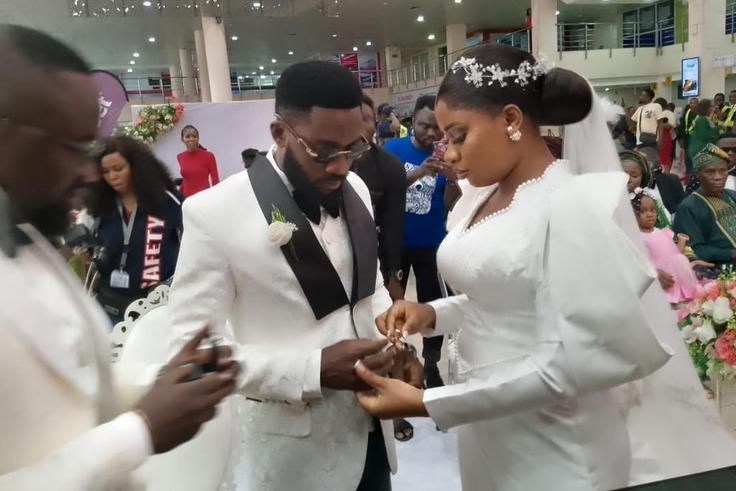 Passengers stunned as couple takes wedding vows at MMA2 Lagos