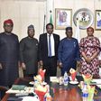 Minister of State Petroleum Resources (Gas) and Chairman, Governing Council of the Midstream Downstream Gas Infrastructure Fund (MDGIF), Mr Ekperikpe Ekpo (middle) with members during the inauguration meeting of the Council in Abuja [NAN[