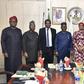 Minister of State Petroleum Resources (Gas) and Chairman, Governing Council of the Midstream Downstream Gas Infrastructure Fund (MDGIF), Mr Ekperikpe Ekpo (middle) with members during the inauguration meeting of the Council in Abuja [NAN[