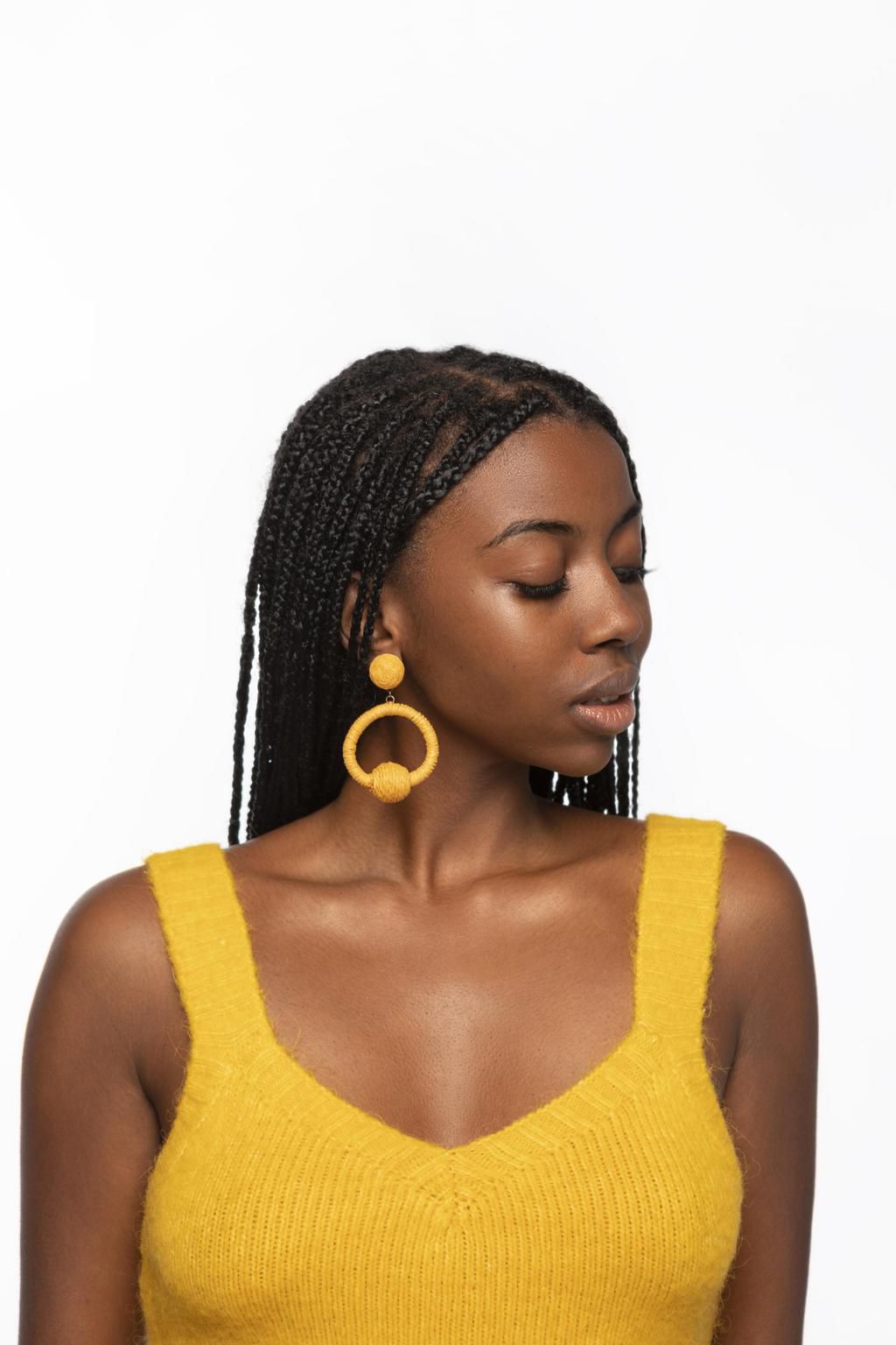 A woman with elegant earrings