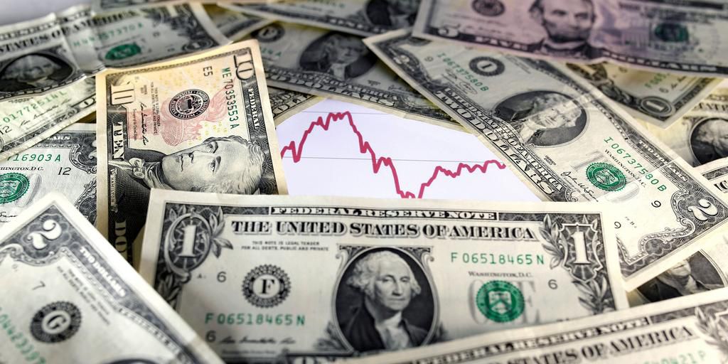 FILE PHOTO: U.S. dollar notes are seen in front of a stock graph in this picture illustrationReuters