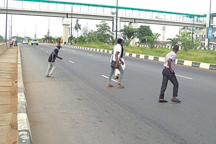 People crossing the highway [TGN]