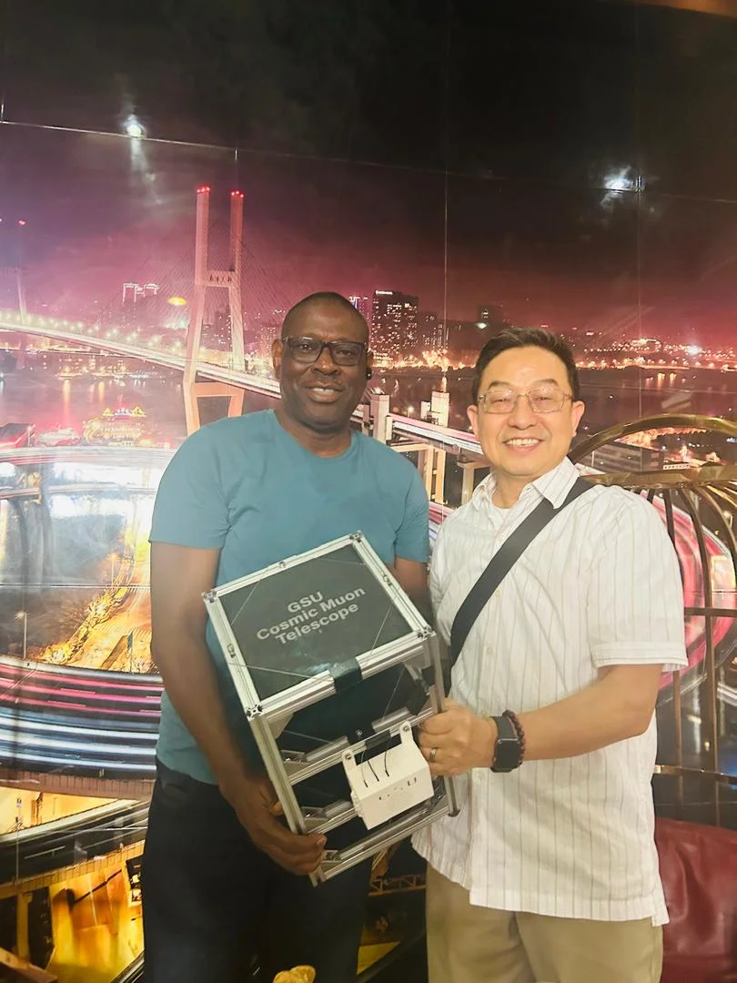 Prof Babatunde Rabiu, Director, UN-ARCSSTE-E, and Prof He Xiaochun, Georgia State University, with the cosmic ray muon detector [NAN]