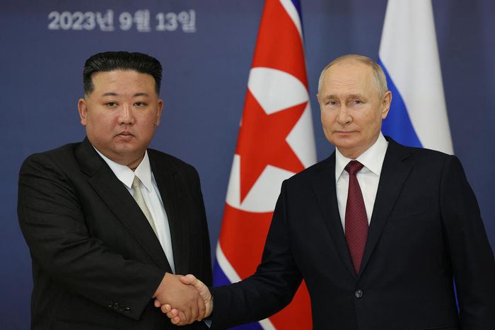 Russian President Vladimir Putin (R) and North Korea's leader Kim Jong Un (L). [Getty Images]