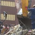 Emergency workers on scene of Lagos building collapse