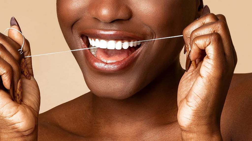 Floss daily [Shutterstock]